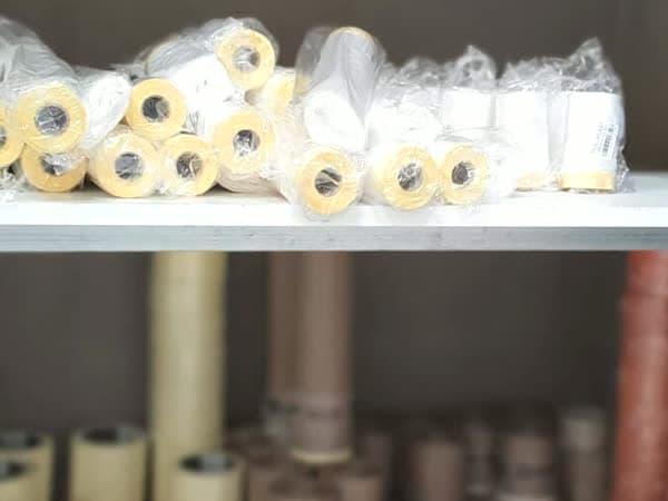 Cintas de carrocero y papel para proteger el suelo en Ames